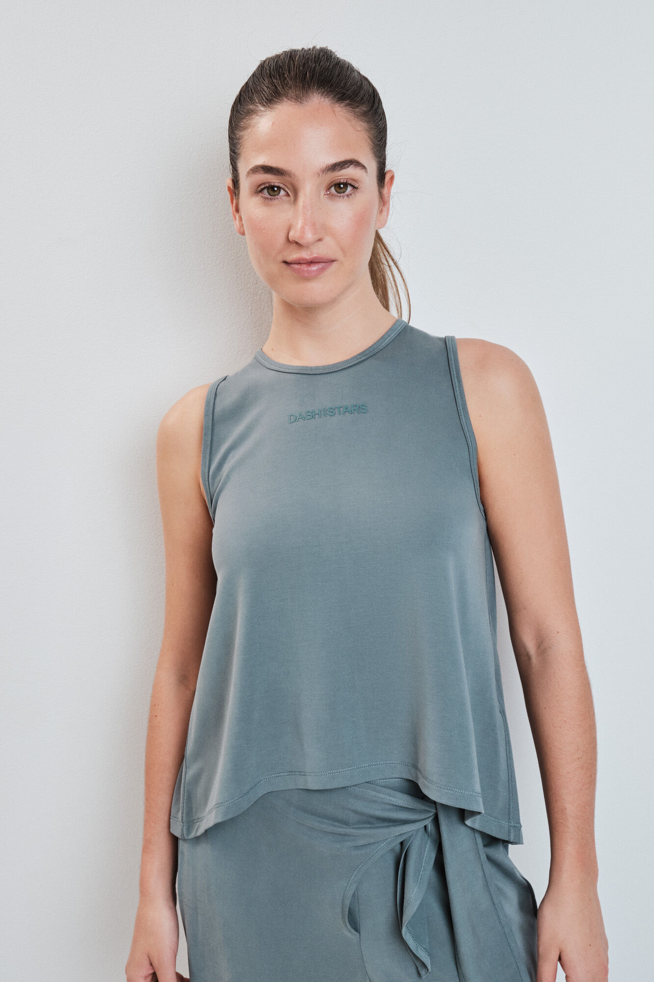 Dash and Stars Green soft touch vest top
