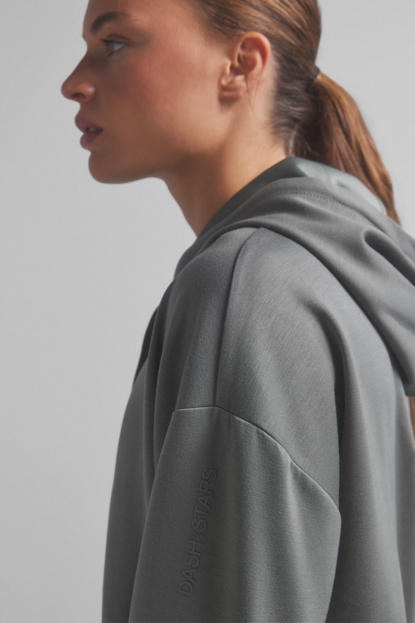 Dash and Stars Soft khaki hood sweatshirt.