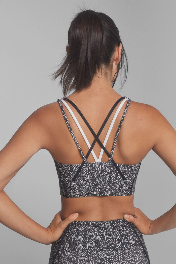 Dash and Stars 4D sports bra in a b & amp print; w black