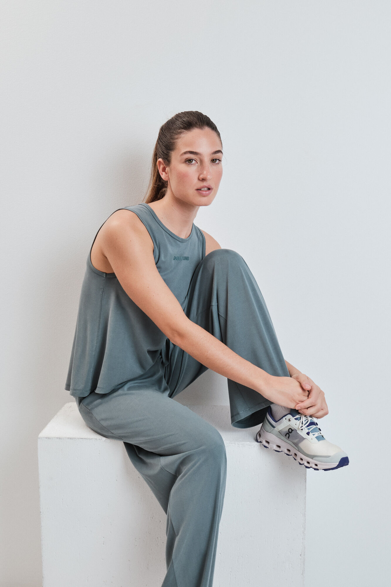 Dash and Stars Green soft touch vest top