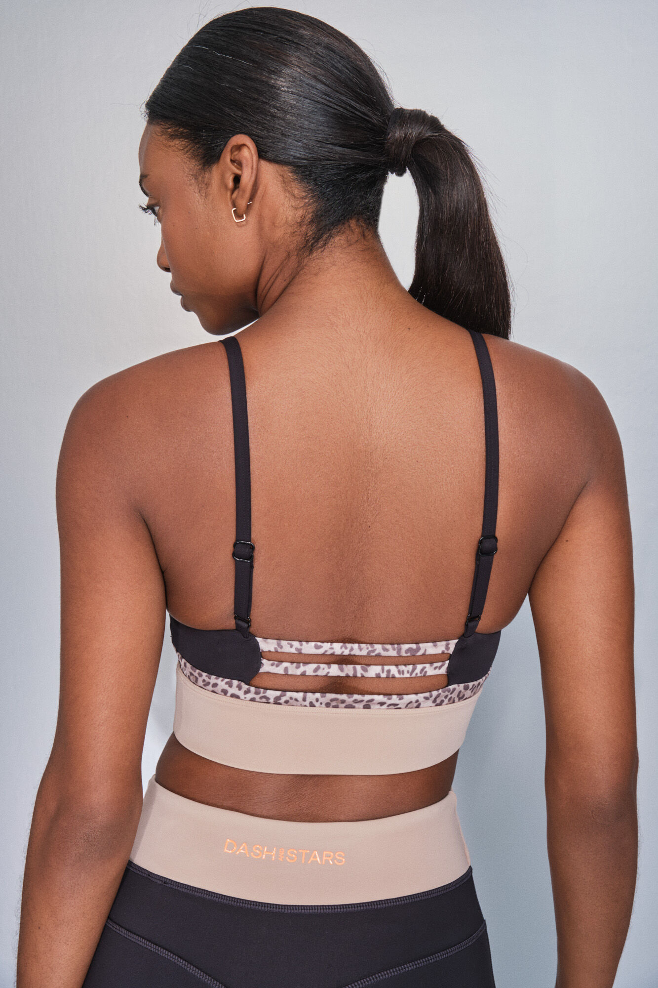 Dash and Stars 4D STRETCH black animal print sports bra 