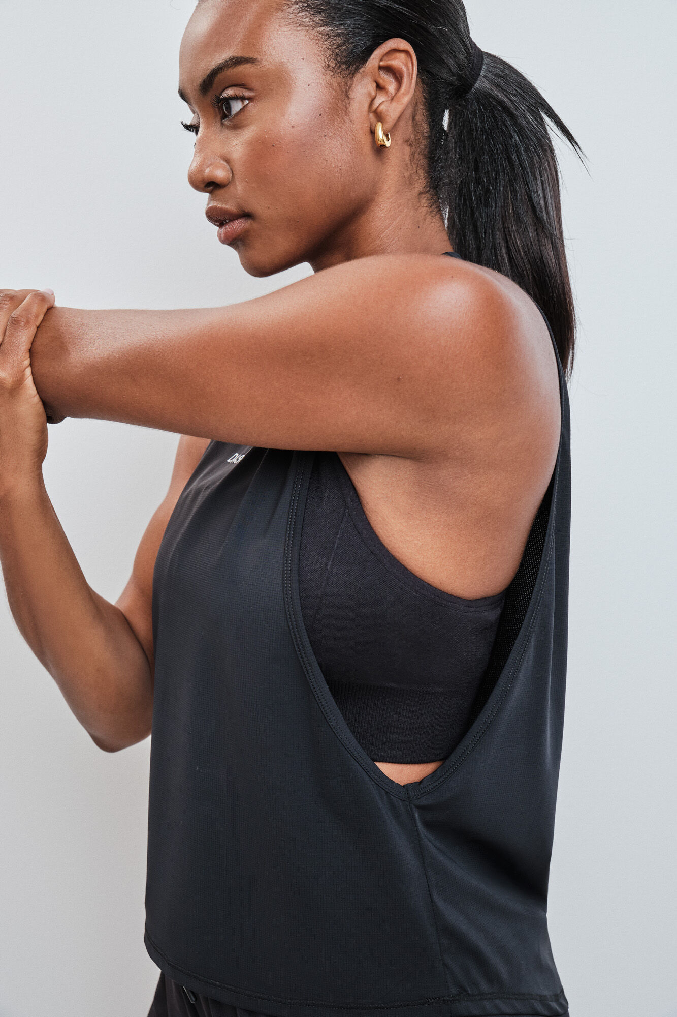 Dash and Stars Black sleeveless technical T-shirt