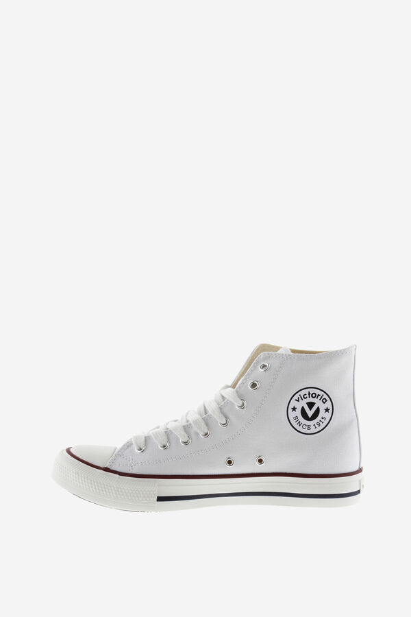 Victoria Unisex canvas high-top sneakers. victory stamp printed on the side in a gloss finish and label on the tongue. 2.5 cm sole and reinforced toe for added resistance and durability. They have a high-density insole for greater comfort. white