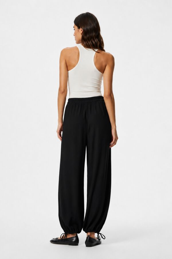 Pieces Cal&ccedil;a folgada fluida preto