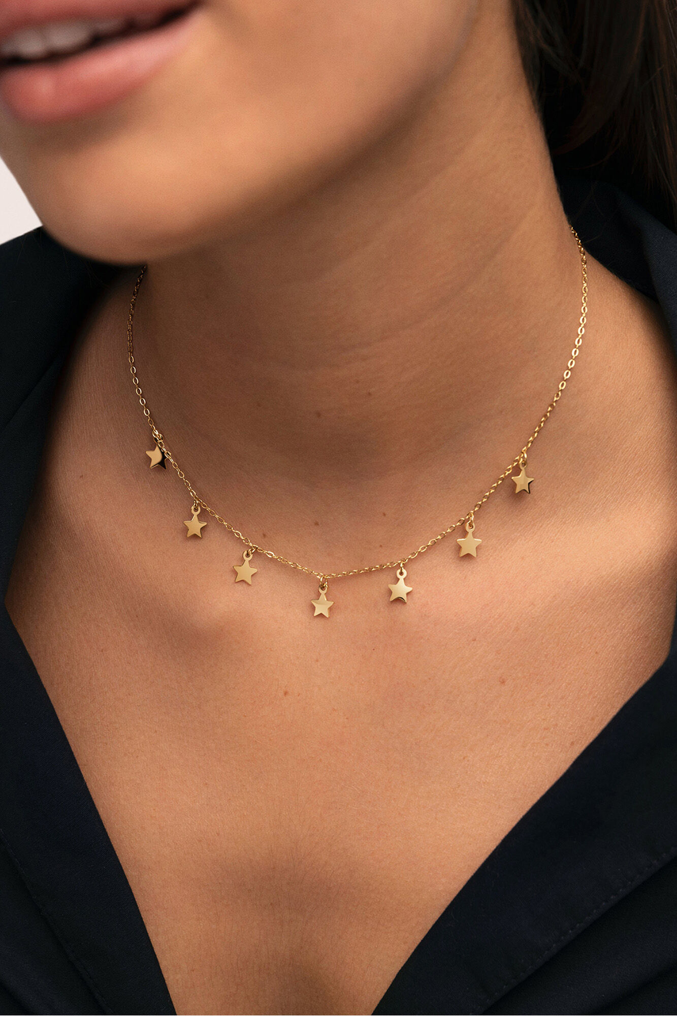 Singularu Halskette Mini-Sterne aus Stahl, vergoldet