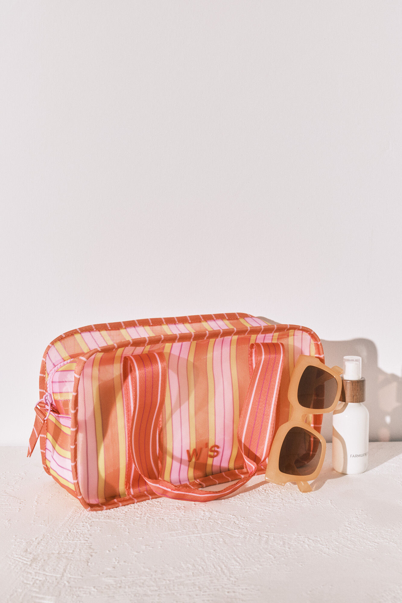 Women'secret Pink and orange striped mesh medium vanity case