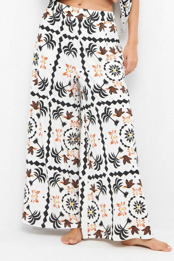 Gisela Tropical print long trousers white