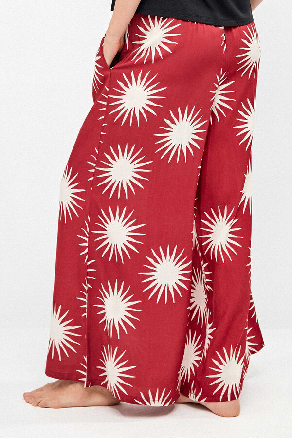 Gisela Pantal&oacute;n largo pierna ancha estampado soles blanco