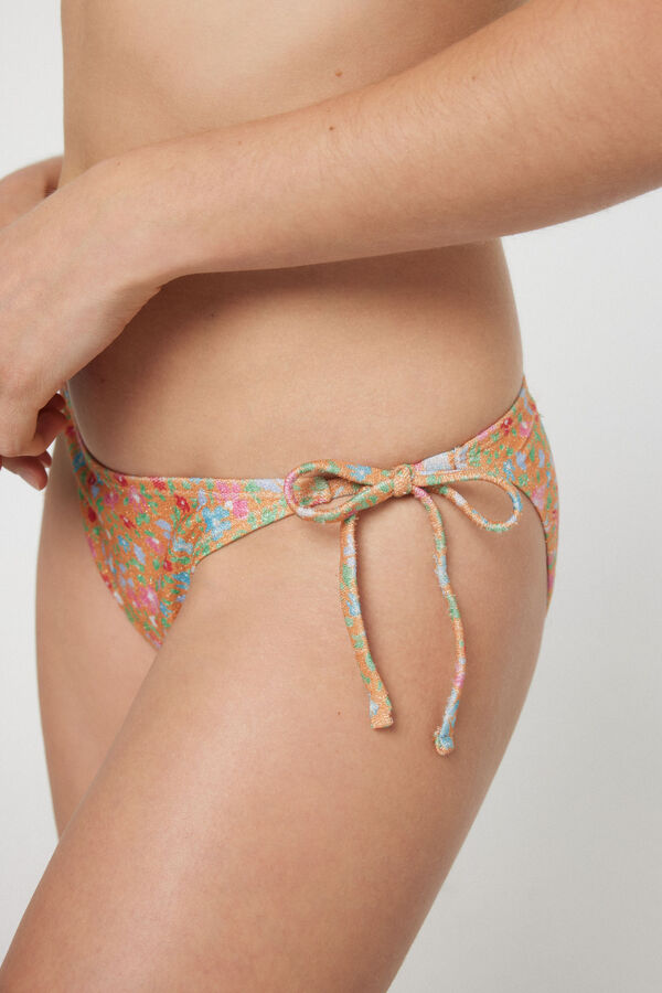 Womensecret Bikini bottoms in a floral print with side ties. Narančasta