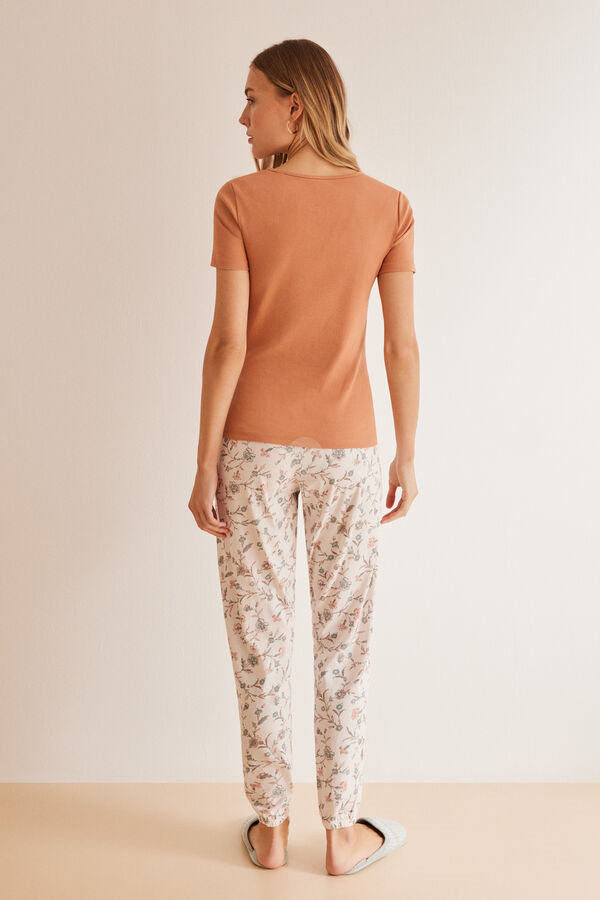 Womensecret Orange pyjamas in 100% cotton with floral print bottoms Narandžasta