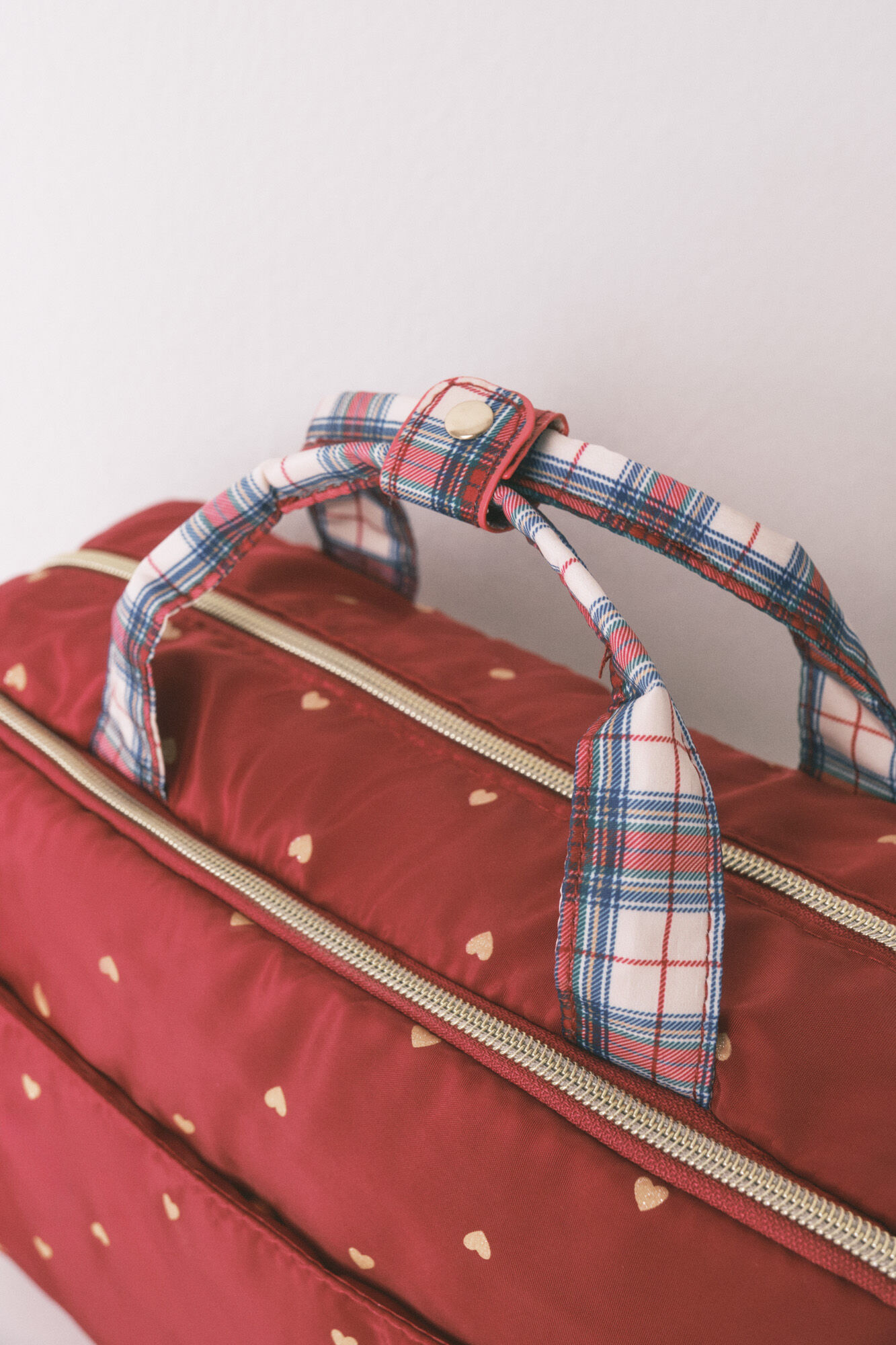 Women'secret Grande trousse de toilette en nylon rouge avec imprim&eacute; c&oelig;ur