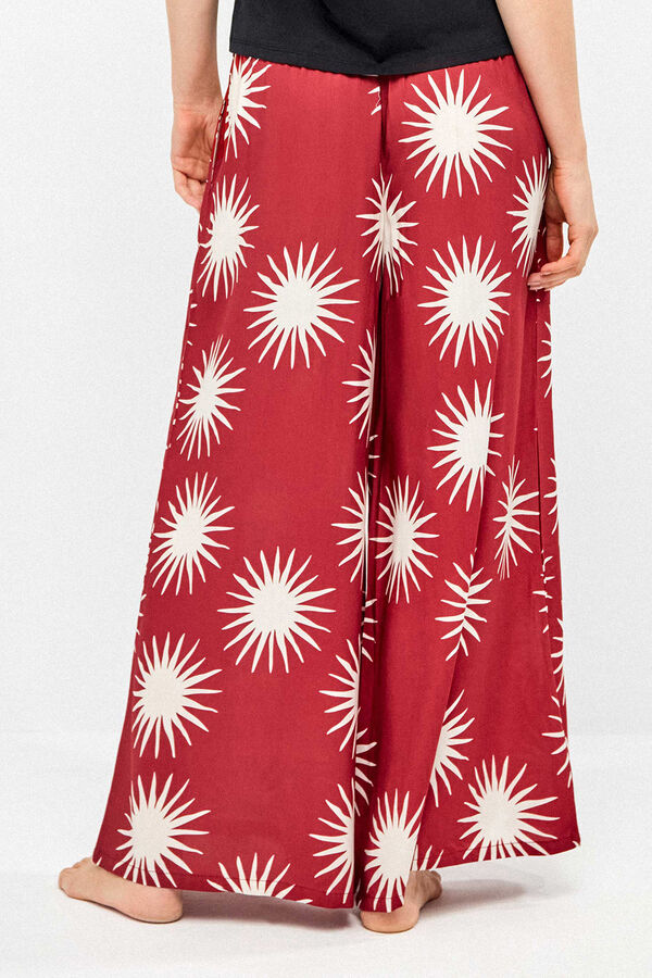 Gisela Pantal&oacute;n largo pierna ancha estampado soles blanco