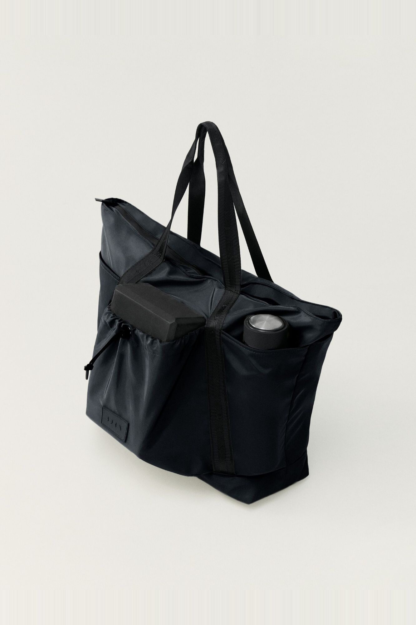 Born Living Yoga Schwarze Reisetasche