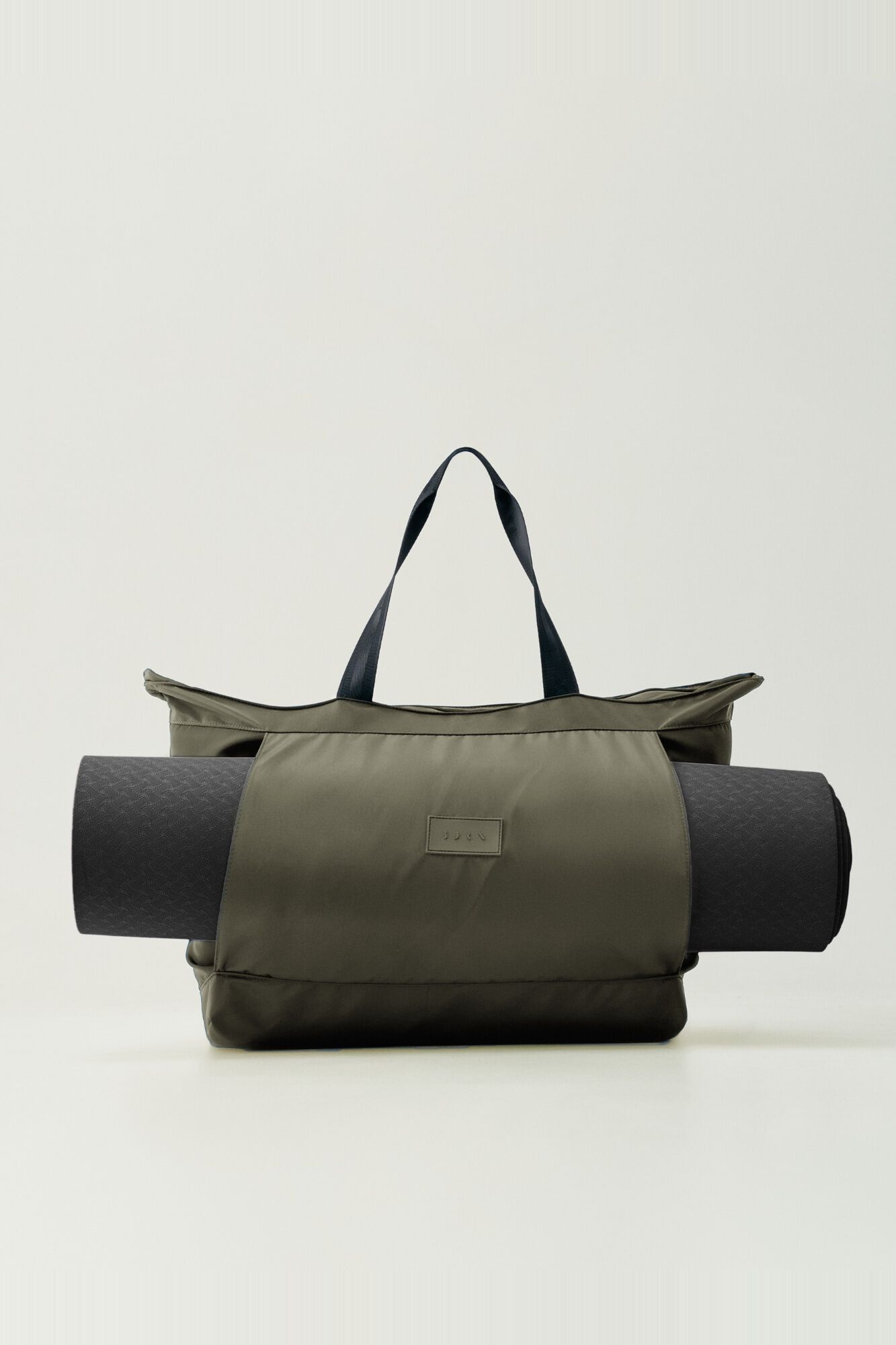Born Living Yoga Khakifarbene Ebbe Tasche