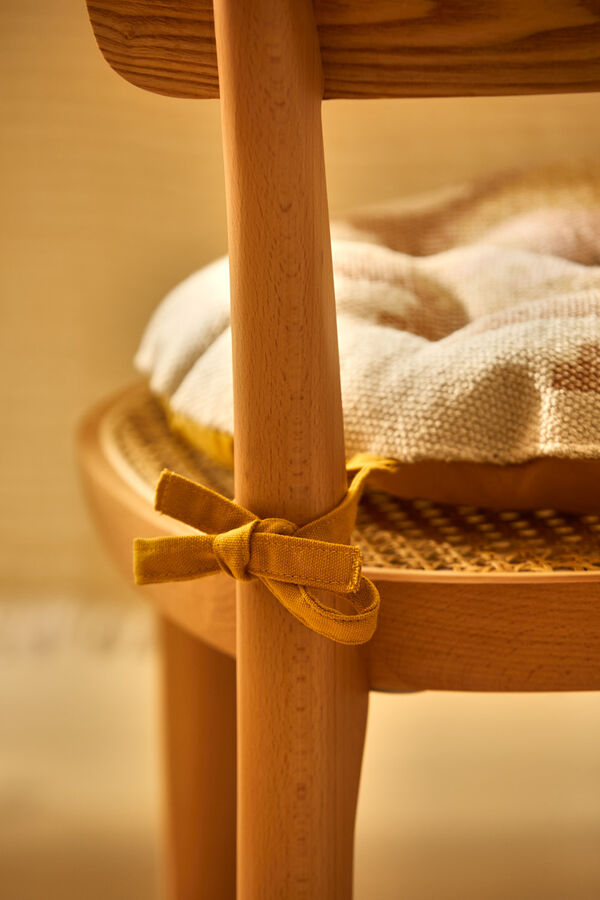 Calma House Berta rundes Stuhlkissen aus senfgelber Dhurrie-Baumwolle mit Print