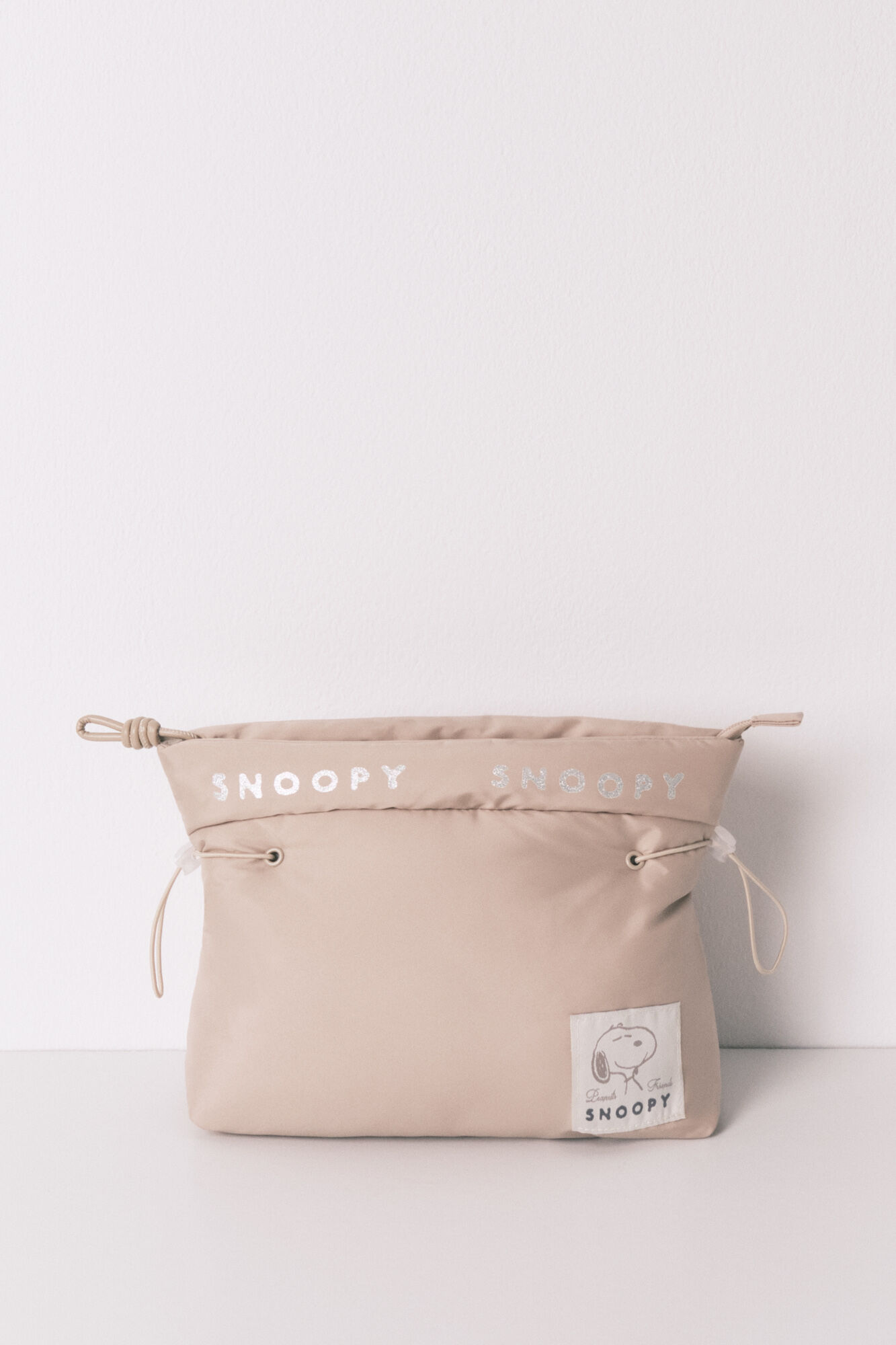 Women'secret N&eacute;cessaire m&eacute;dia acolchoada bege Snoopy