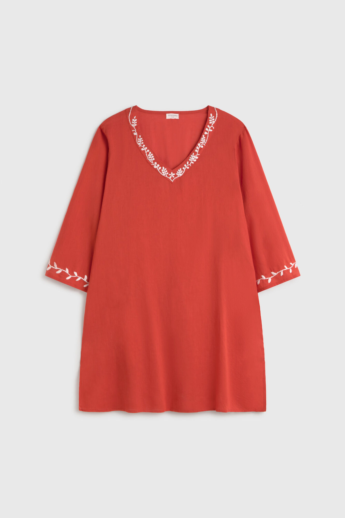 Textura T&uacute;nica algod&oacute;n aplique en el cuello