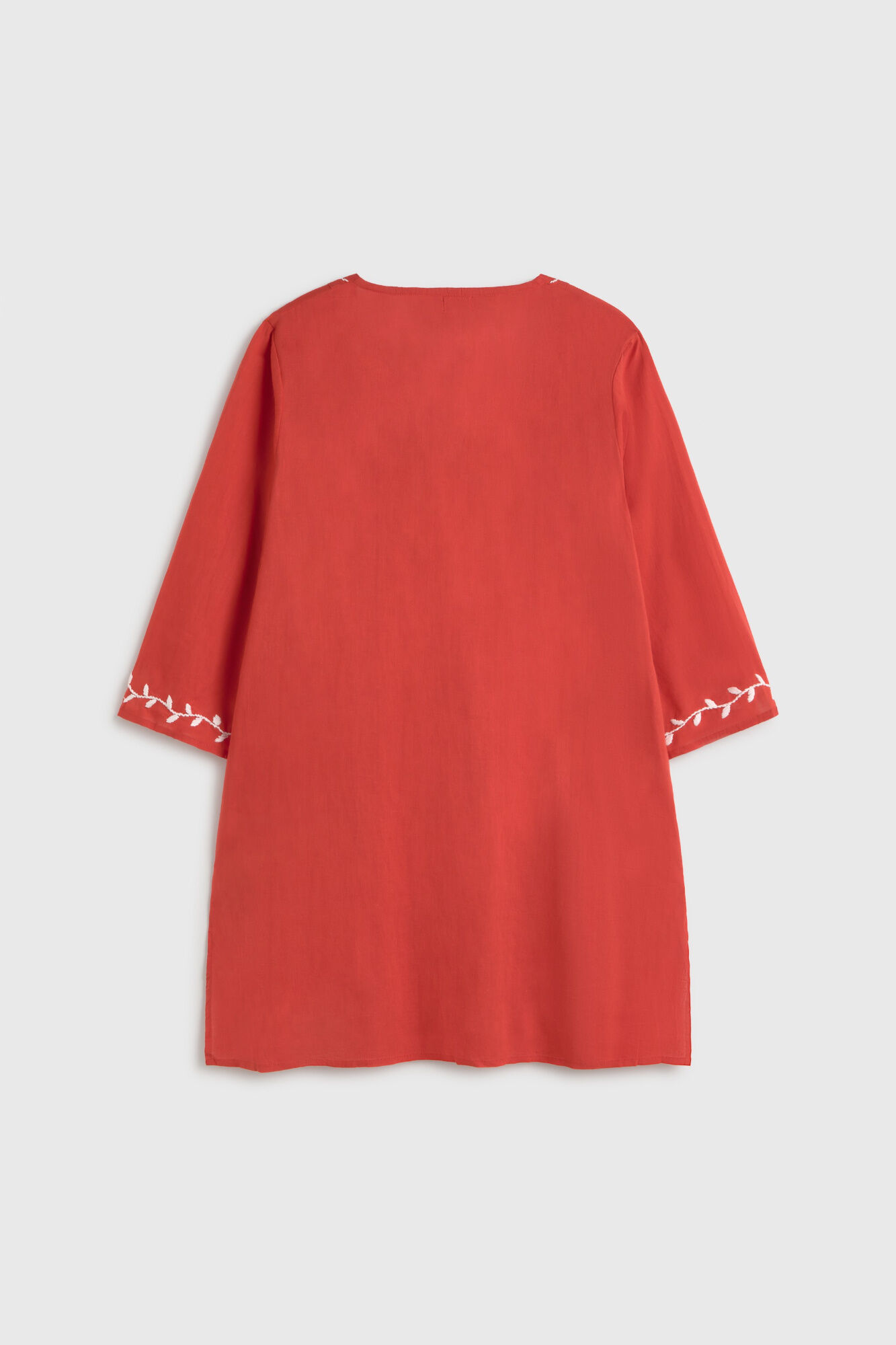 Textura T&uacute;nica algod&oacute;n aplique en el cuello