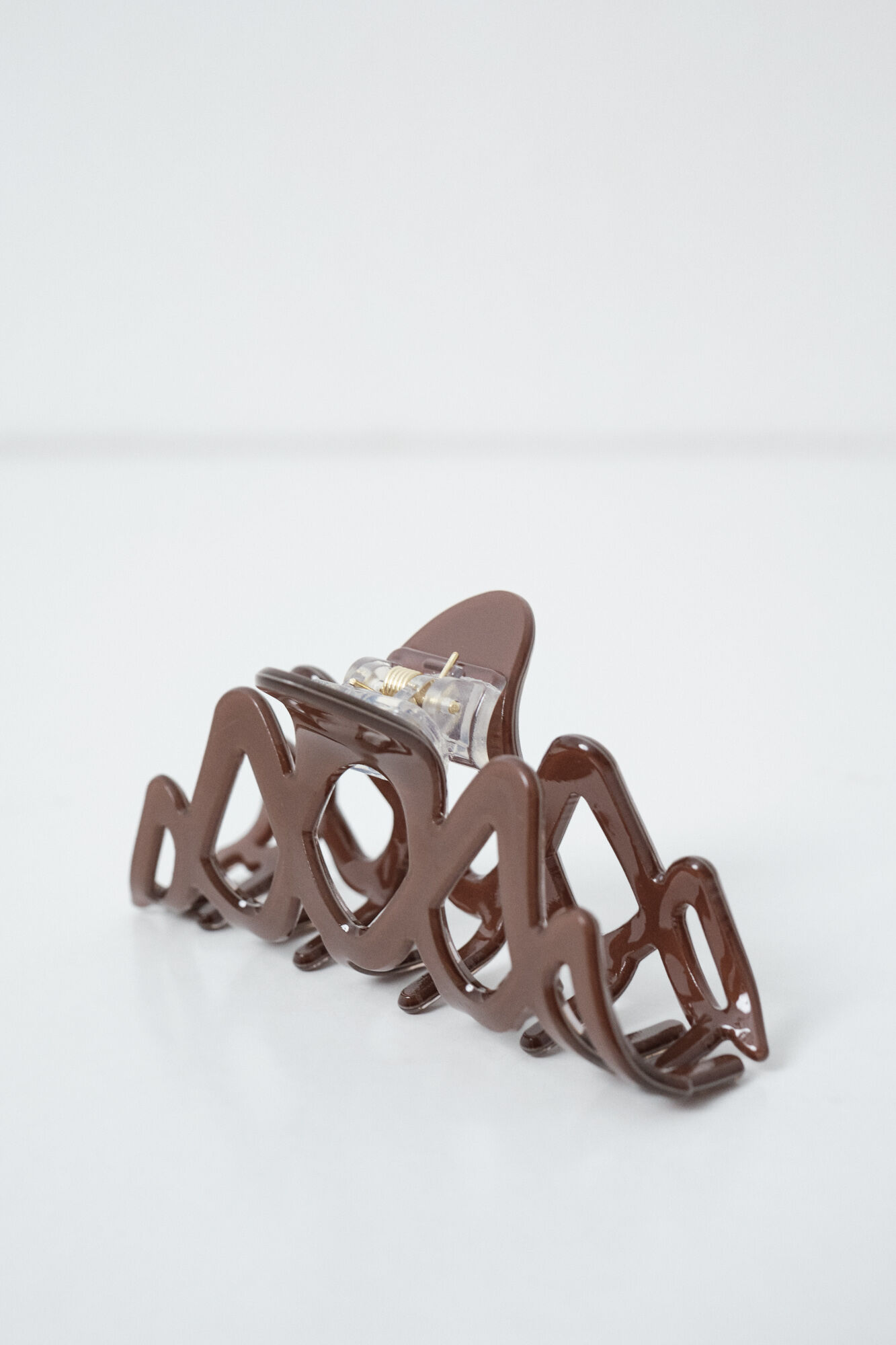 Women'secret Braune Haarspange mit Wellen