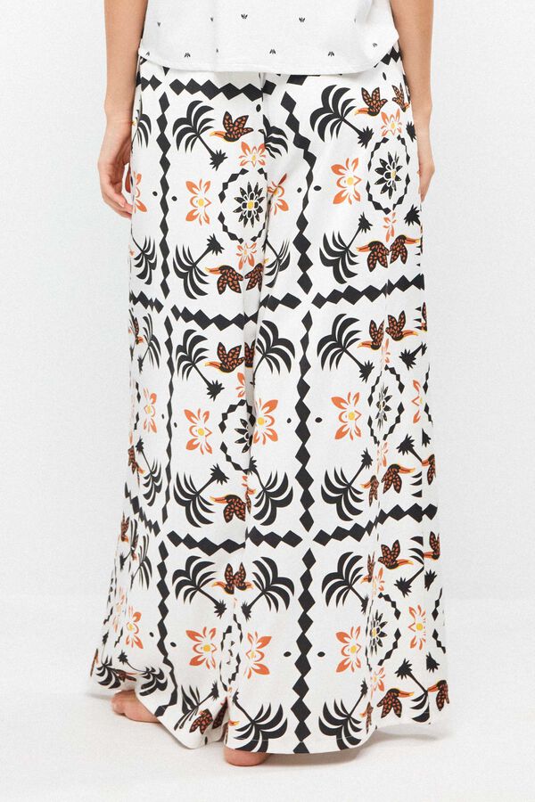 Gisela Tropical print long trousers white