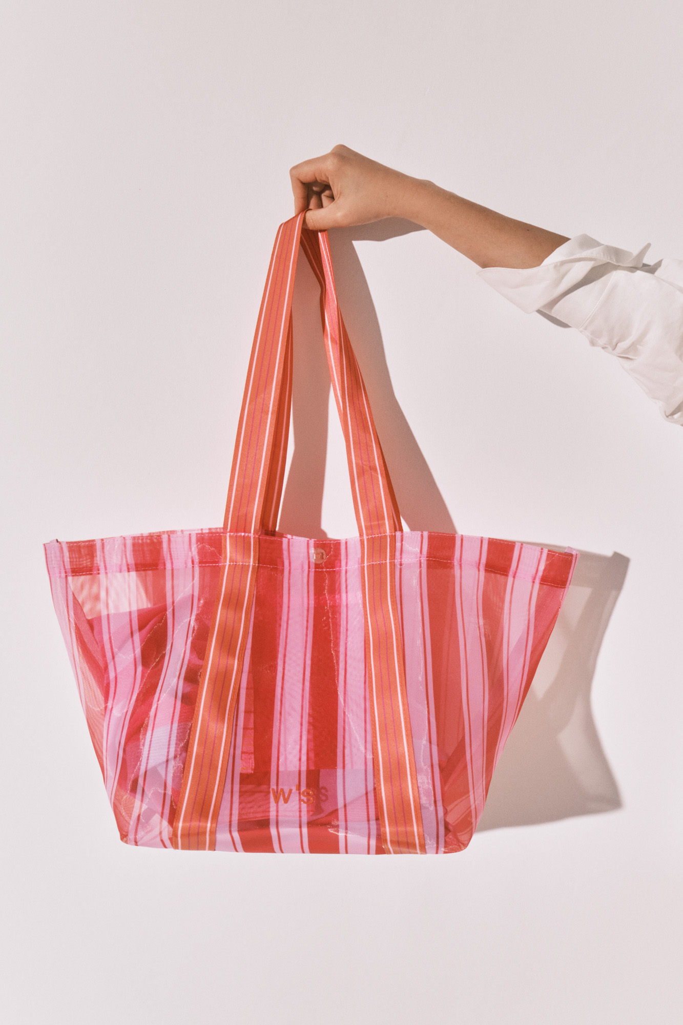 Pink and orange striped mesh large handbag | Bags | WomenSecret