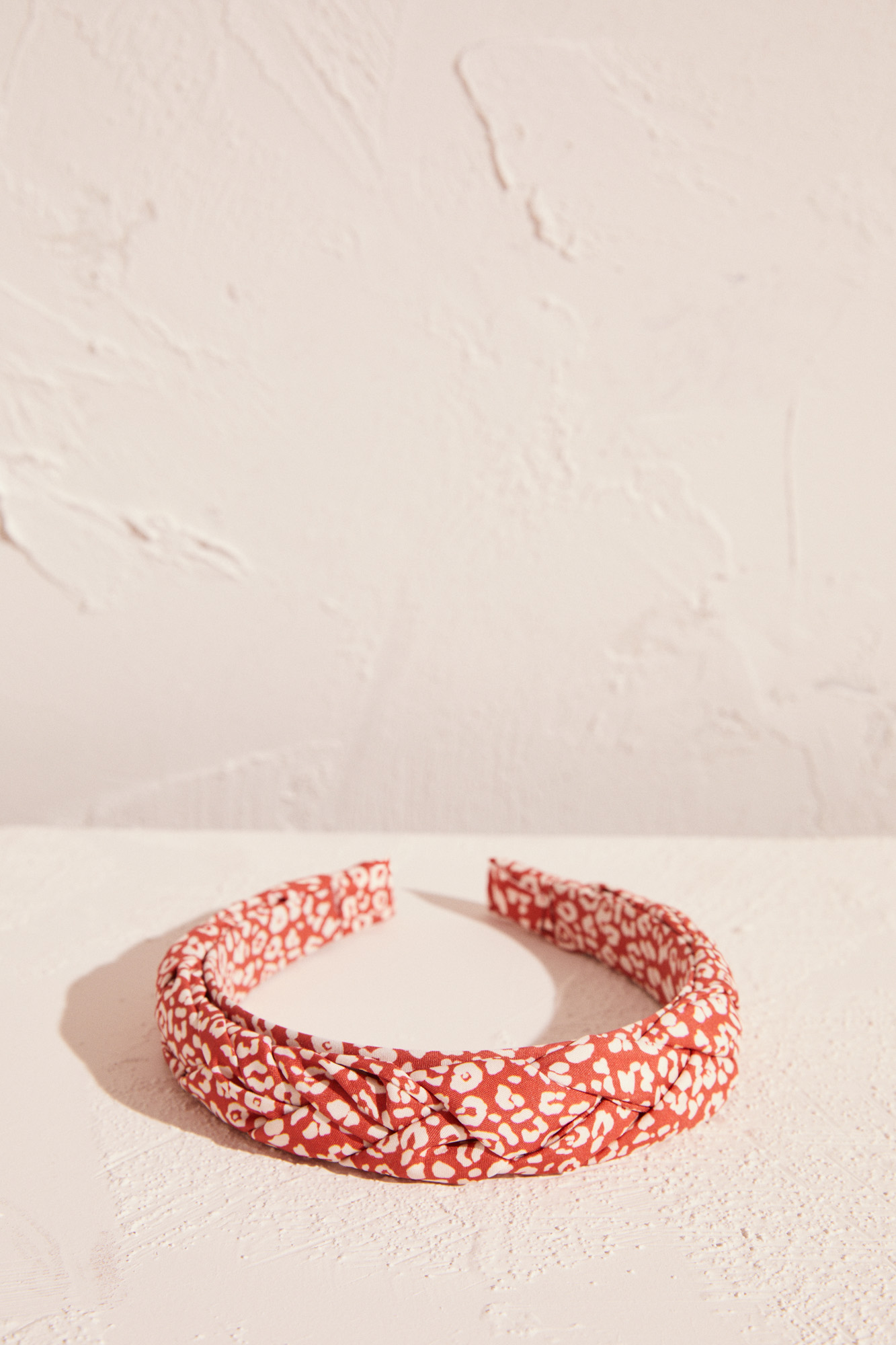 Diadema trenzada estampado | Complementos y accesorios de mujer | WomenSecret