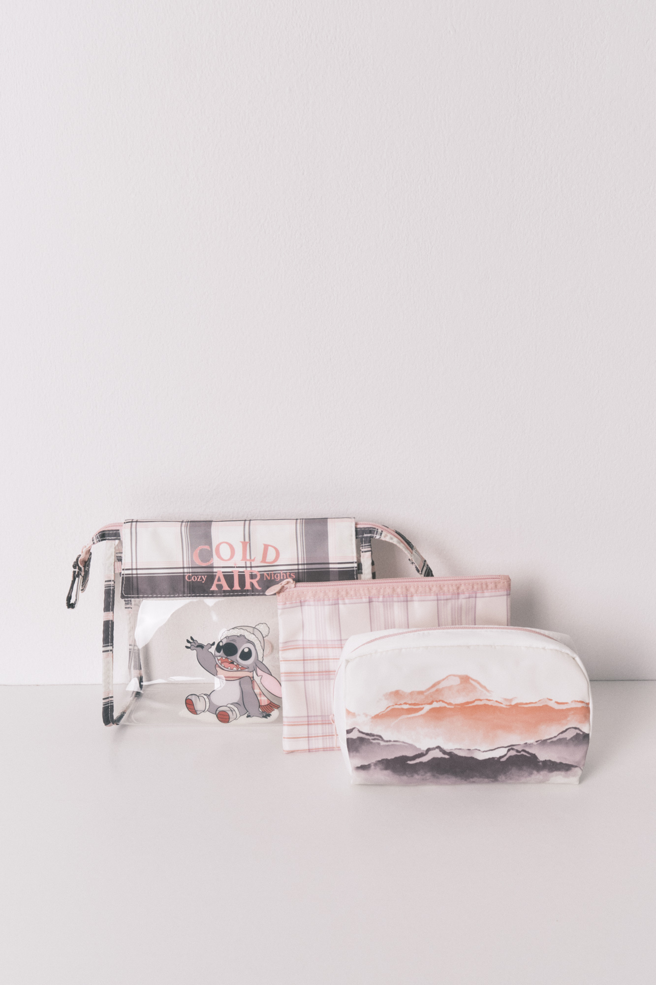 Pack 3 neceseres estampado cuadros Stitch